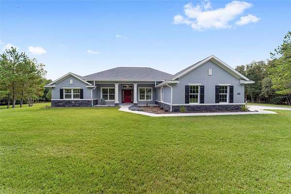28.2 Acres of Land with Home for Sale in Williston, Florida