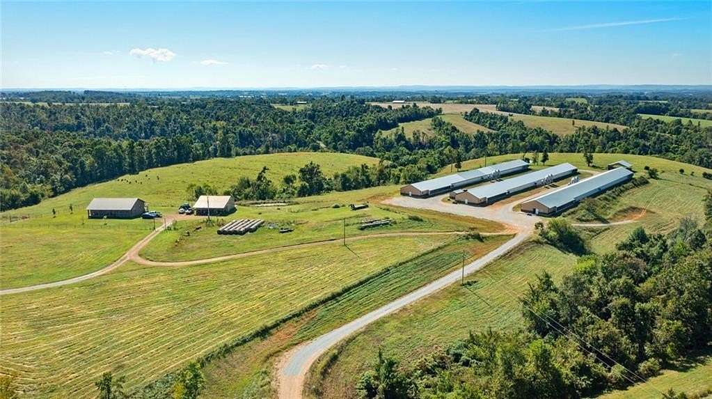 22 Acres of Agricultural Land with Home for Sale in Rogers, Arkansas