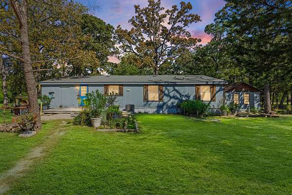 38 Acres of Land with Home for Sale in Quinlan, Texas