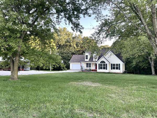 5 Acres of Residential Land with Home for Sale in Cassville, Missouri