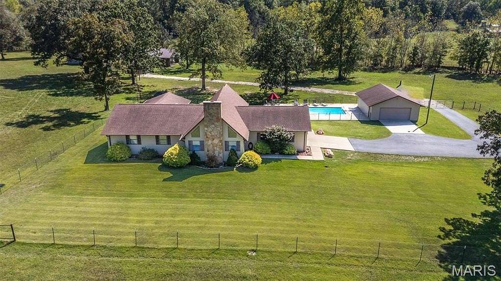 18.8 Acres of Land with Home for Sale in Poplar Bluff, Missouri