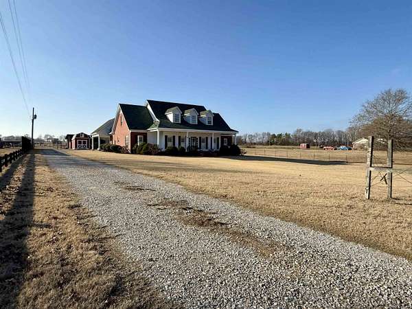 5.1 Acres of Land with Home for Sale in Whiteville, Tennessee
