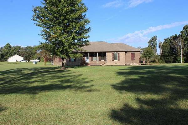 3.3 Acres of Residential Land with Home for Sale in Yuma, Tennessee