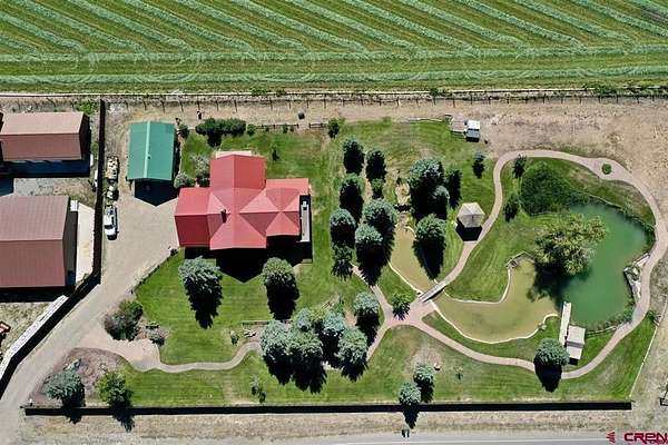 1.79 Acres of Residential Land with Home for Sale in Montrose, Colorado
