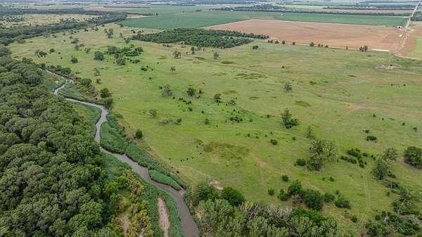 135 Acres of Recreational Land & Farm for Auction in Sterling, Kansas