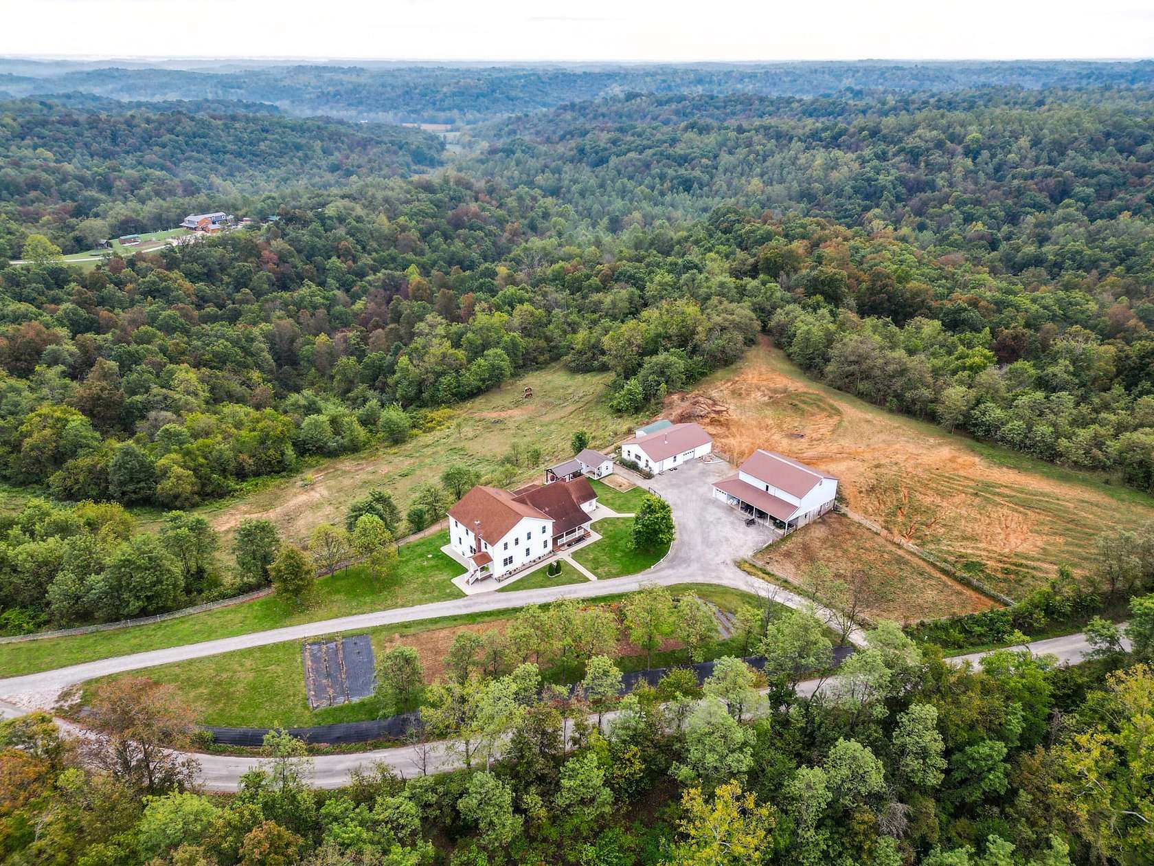 76 Acres of Land with Home for Sale in Patriot, Ohio