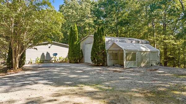 18.7 Acres of Land with Home for Sale in Dickson, Tennessee