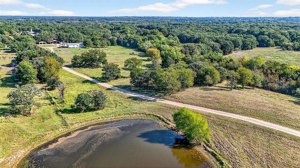 10.8 Acres of Land with Home for Sale in Collinsville, Texas