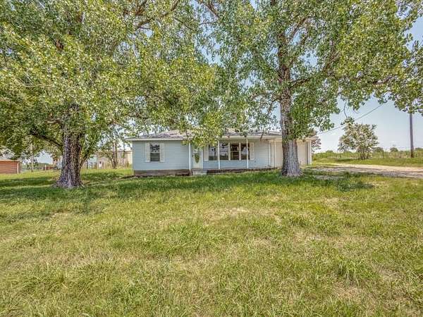 4.4 Acres of Residential Land with Home for Lease in Pecan Gap, Texas