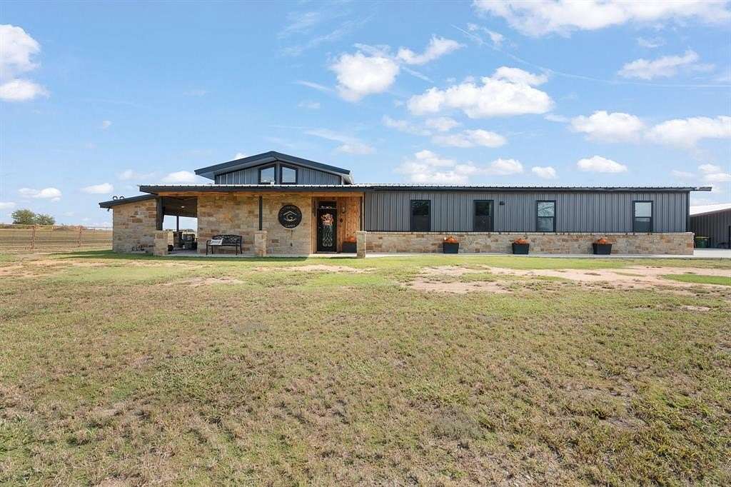 10 Acres of Residential Land with Home for Sale in Blum, Texas