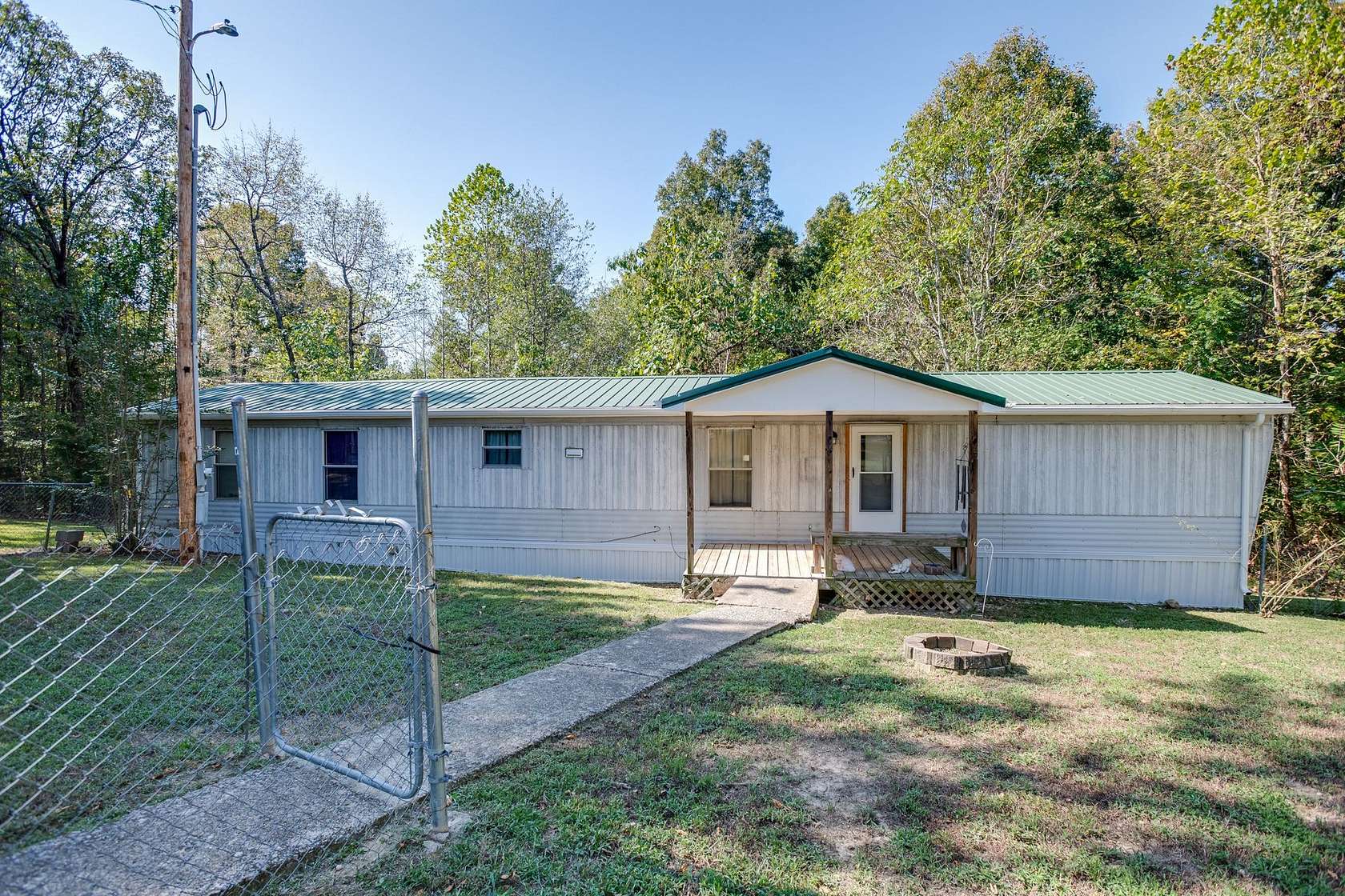 5 Acres of Residential Land with Home for Sale in Palmyra, Tennessee