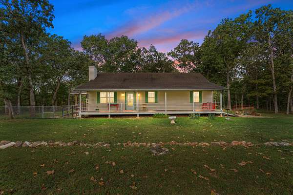 3.1 Acres of Residential Land with Home for Sale in Lowry City, Missouri