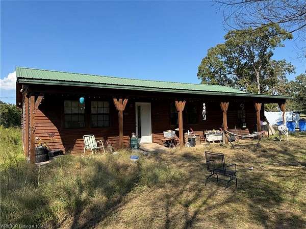 20 Acres of Agricultural Land with Home for Auction in Sallisaw, Oklahoma