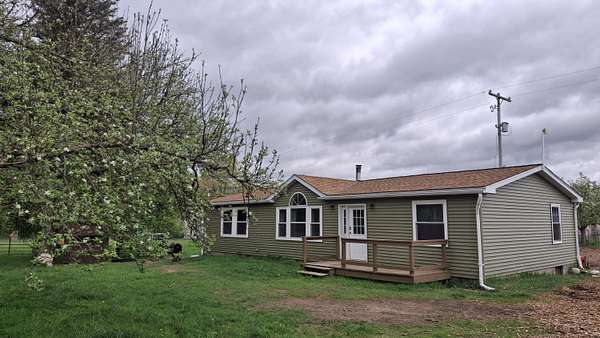 6.58 Acres of Land with Home for Sale in Harrison, Michigan