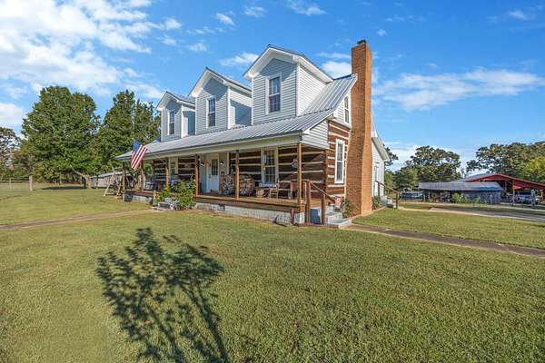 6.69 Acres of Land with Home for Sale in Buena Vista, Tennessee