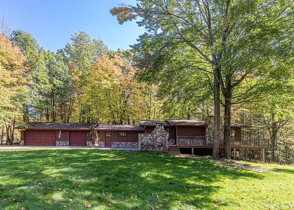 2.74 Acres of Residential Land with Home for Sale in Minocqua, Wisconsin