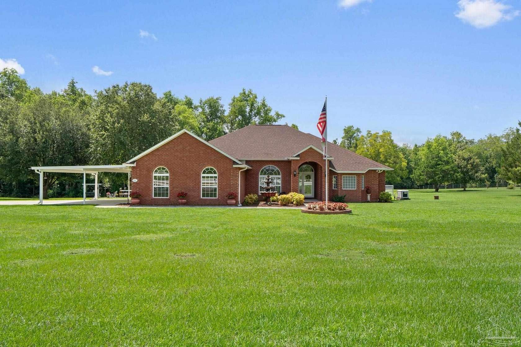 7.55 Acres of Residential Land with Home for Sale in Molino, Florida