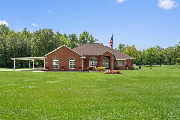 7.55 Acres of Residential Land with Home for Sale in Molino, Florida