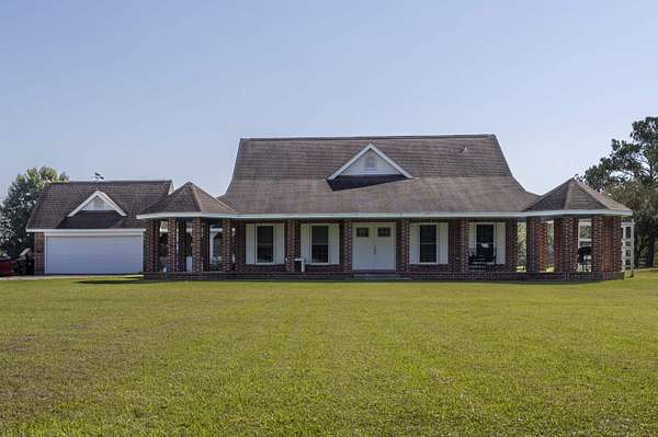 5 Acres of Residential Land with Home for Lease in Sour Lake, Texas