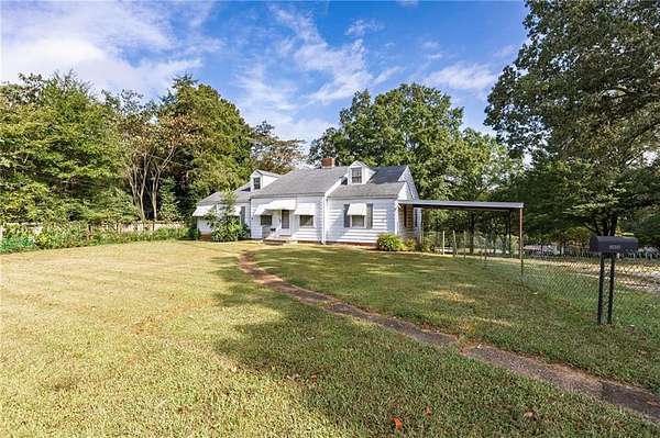 7 Acres of Land with Home for Sale in Austell, Georgia