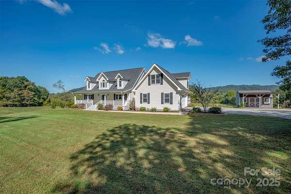 4 Acres of Residential Land with Home for Sale in Fletcher, North Carolina