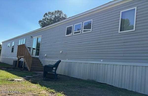 2.6 Acres of Residential Land with Home for Sale in Youngsville, Louisiana