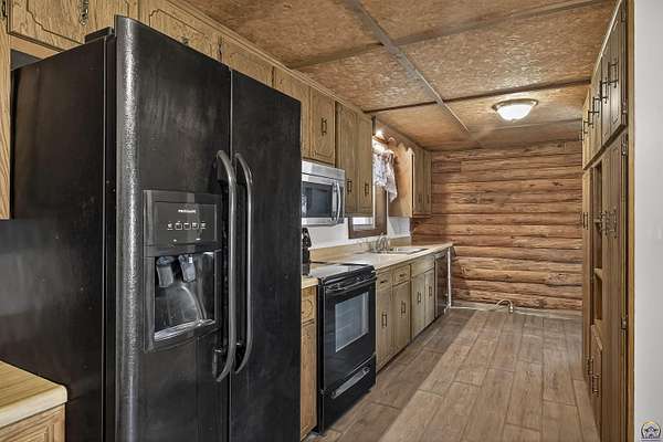 14.7 Acres of Land with Home for Sale in Osage City, Kansas