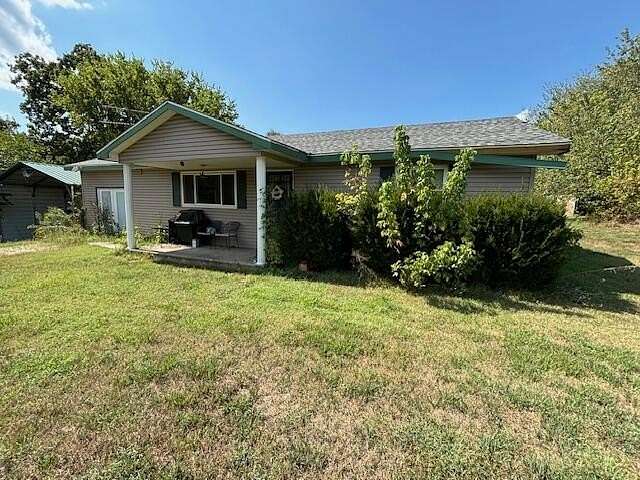 1.8 Acres of Residential Land with Home for Auction in Galena, Missouri