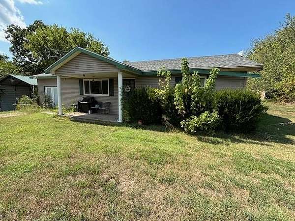 1.8 Acres of Residential Land with Home for Auction in Galena, Missouri