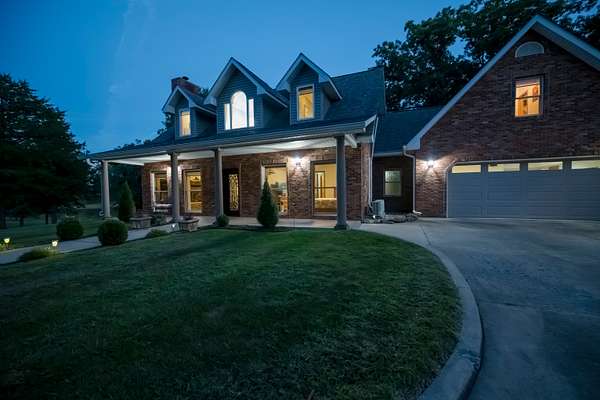 51.8 Acres of Land with Home for Sale in Harrisburg, Missouri