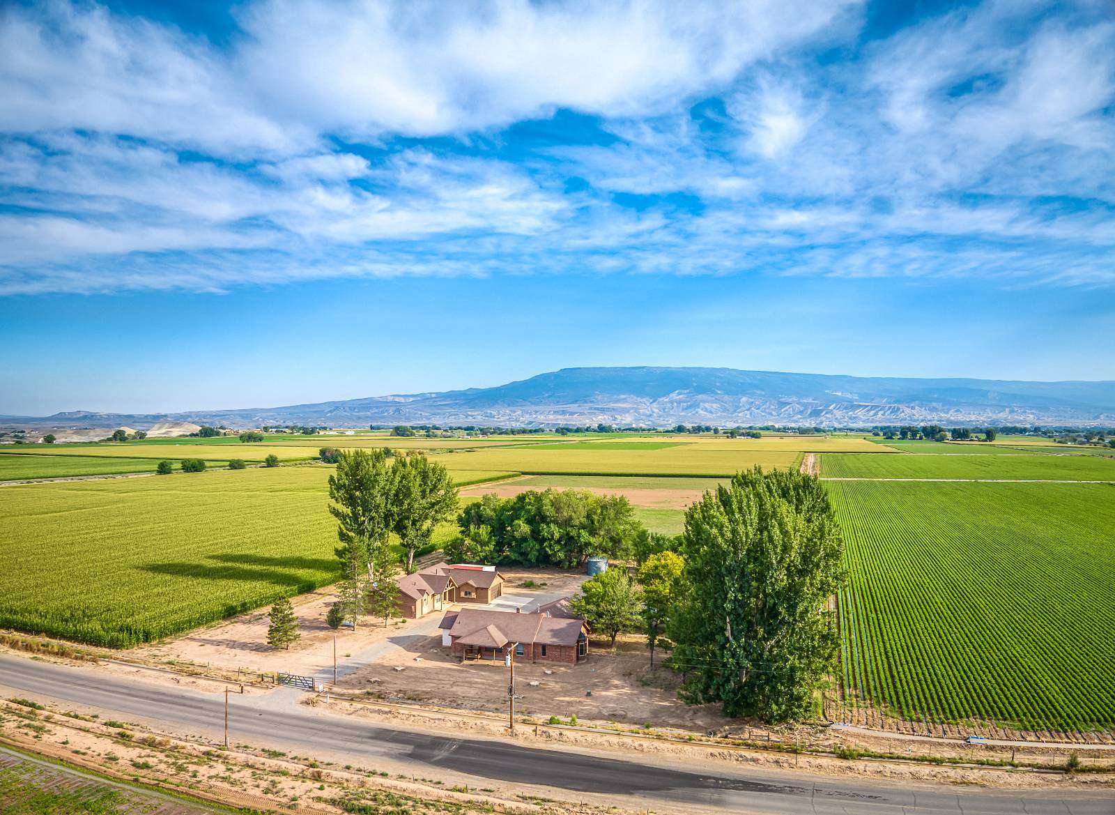 170 Acres of Agricultural Land with Home for Sale in Delta, Colorado