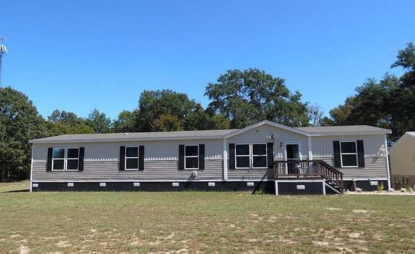 1.3 Acres of Residential Land with Home for Sale in Athens, Texas