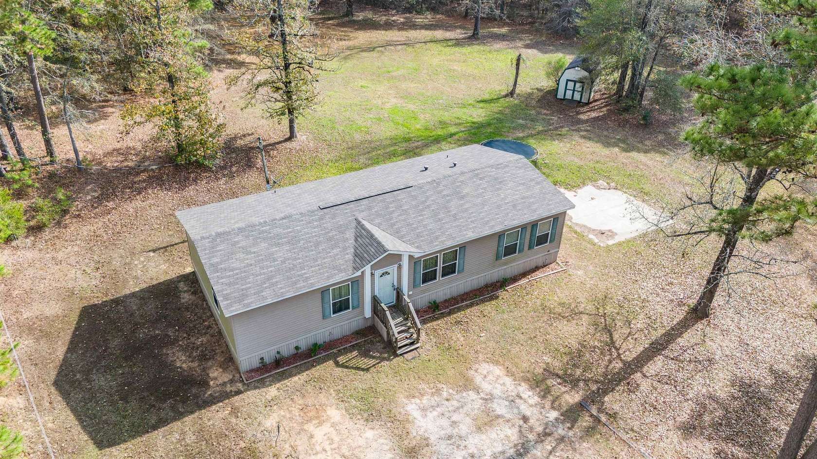 2.3 Acres of Residential Land with Home for Sale in Hallsville, Texas