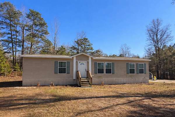 2.3 Acres of Land with Home for Sale in Hallsville, Texas