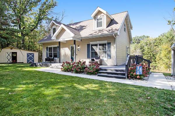 9.15 Acres of Residential Land with Home for Sale in Howard City, Michigan