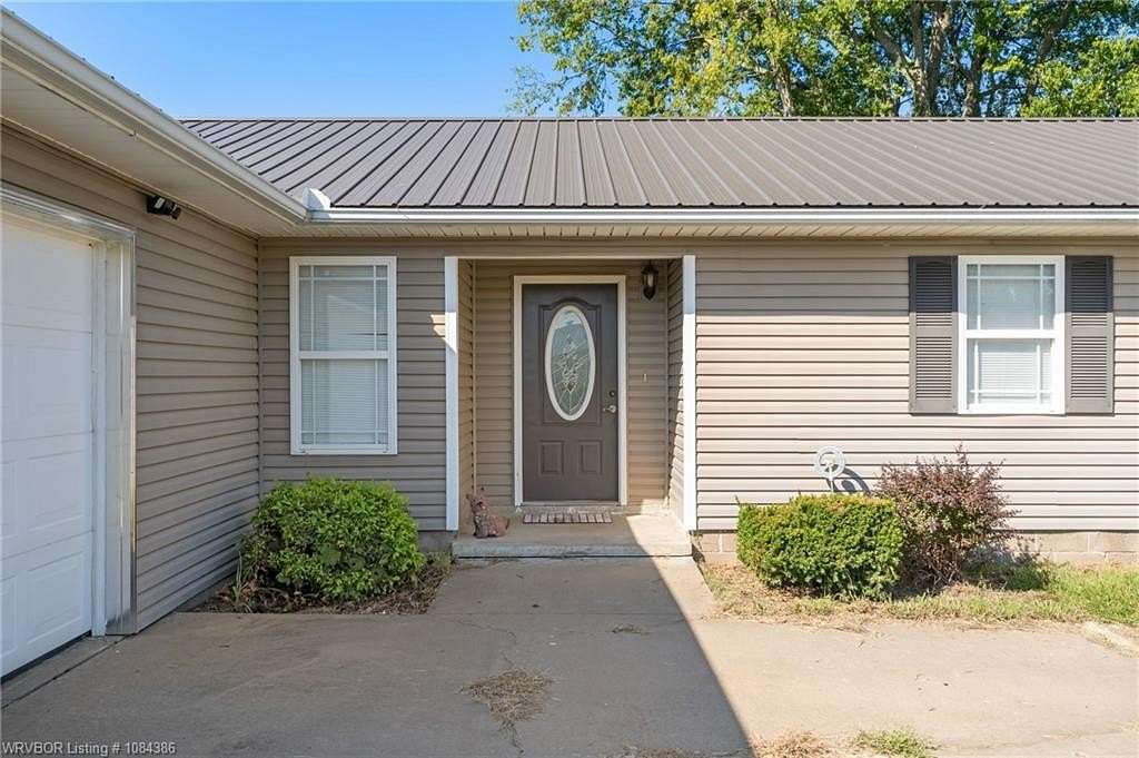 15.6 Acres of Land with Home for Sale in Poteau, Oklahoma