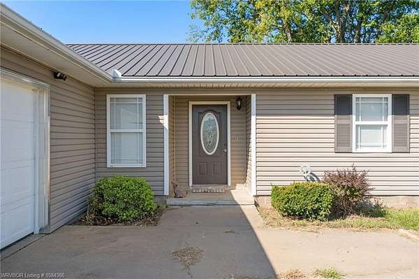 15.6 Acres of Land with Home for Sale in Poteau, Oklahoma