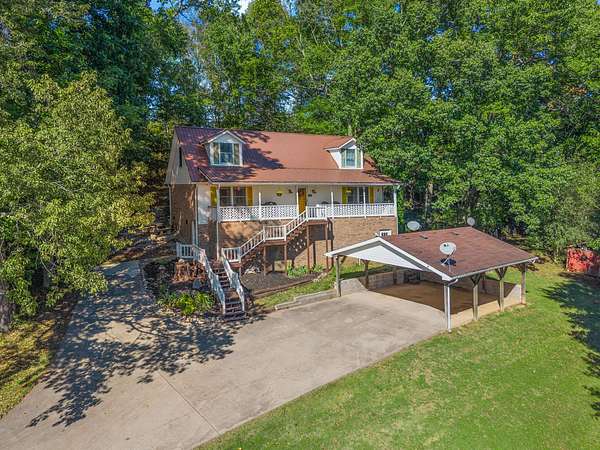 8.8 Acres of Land with Home for Sale in Big Rock, Tennessee