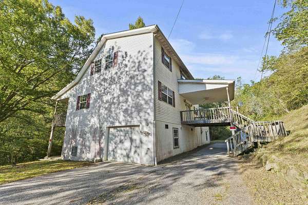 5 Acres of Residential Land with Home for Sale in Crum, West Virginia