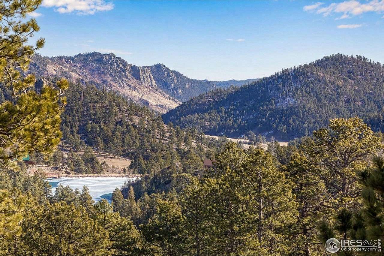 5.52 Acres of Residential Land with Home for Sale in Red Feather Lakes, Colorado