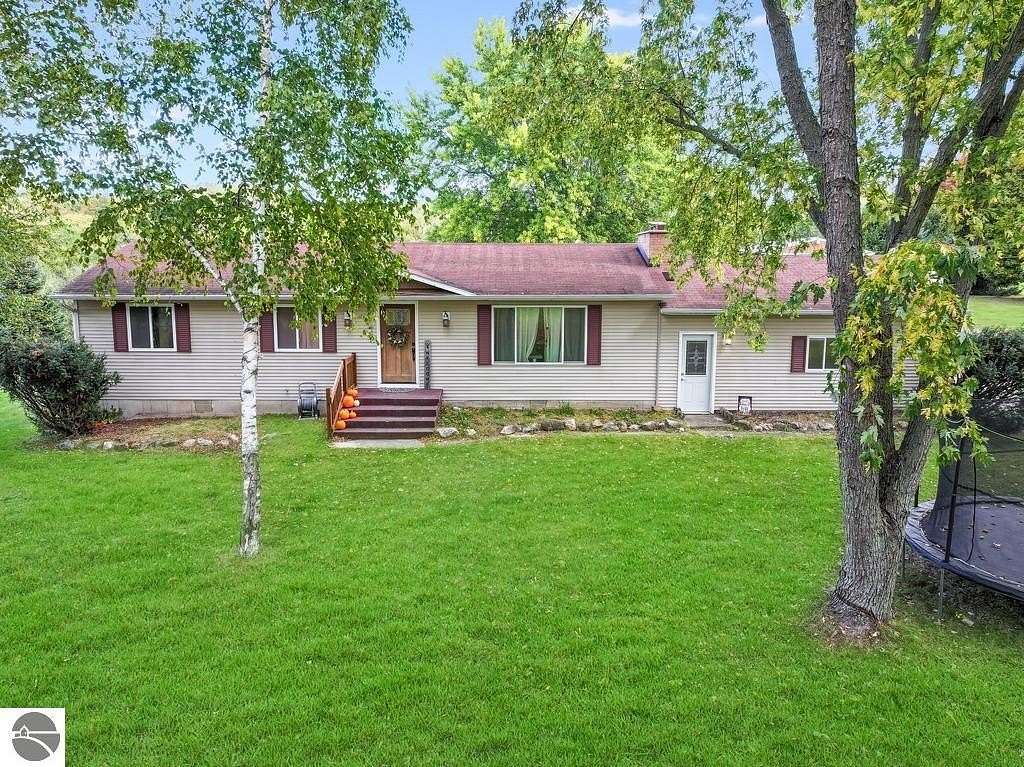 11.1 Acres of Recreational Land with Home for Sale in Riverdale, Michigan