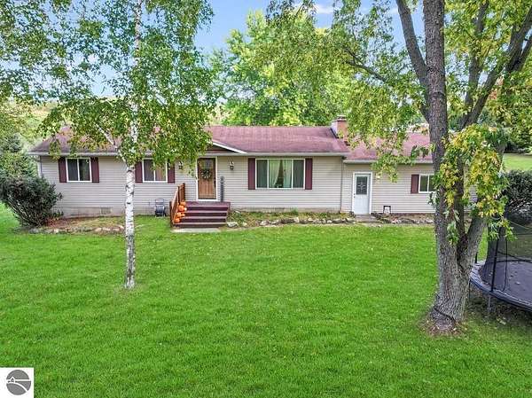 11.1 Acres of Recreational Land with Home for Sale in Riverdale, Michigan