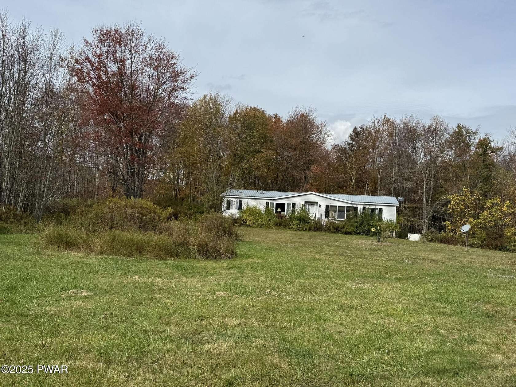 13 Acres of Recreational Land with Home for Sale in Lakewood, Pennsylvania