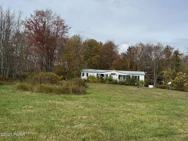 13 Acres of Recreational Land with Home for Sale in Lakewood, Pennsylvania