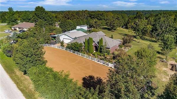 5.3 Acres of Land with Home for Sale in Gravette, Arkansas