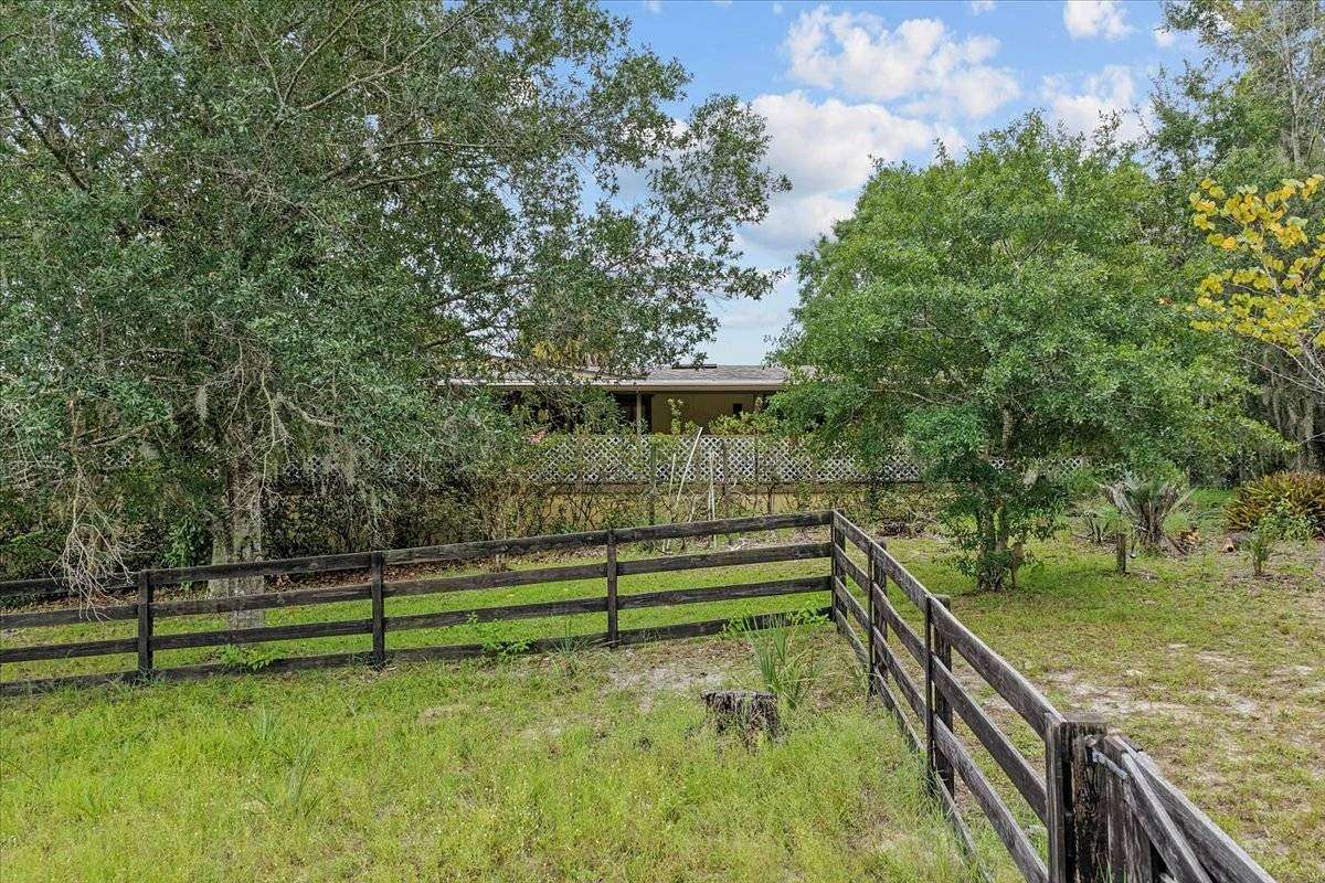 5.7 Acres of Land with Home for Sale in Spring Hill, Florida