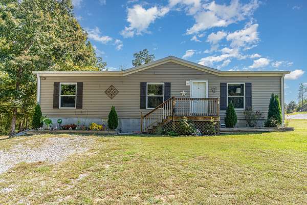 2 Acres of Residential Land with Home for Sale in Bon Aqua, Tennessee