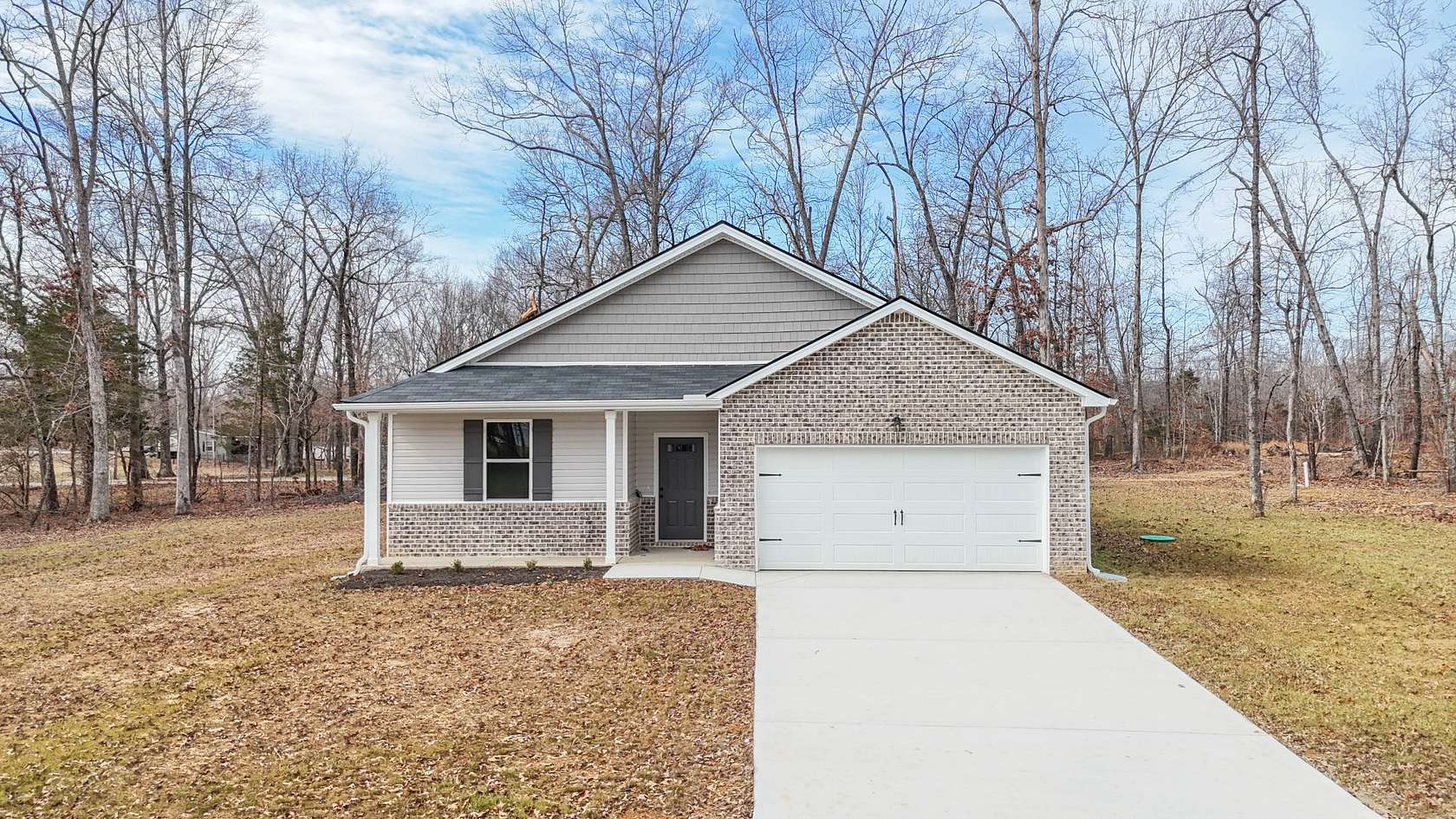 1.5 Acres of Residential Land with Home for Sale in Dickson, Tennessee