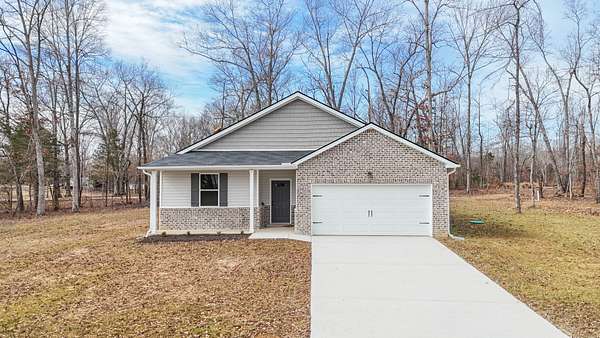 1.5 Acres of Residential Land with Home for Sale in Dickson, Tennessee