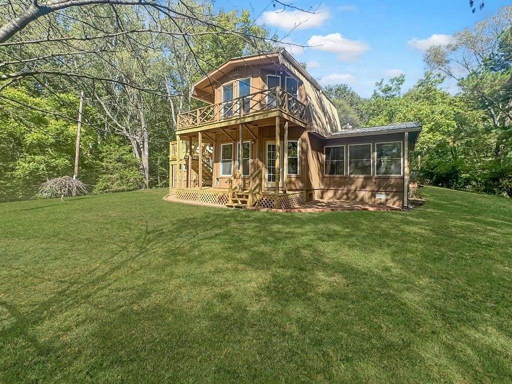 10.8 Acres of Land with Home for Sale in Dover, Tennessee